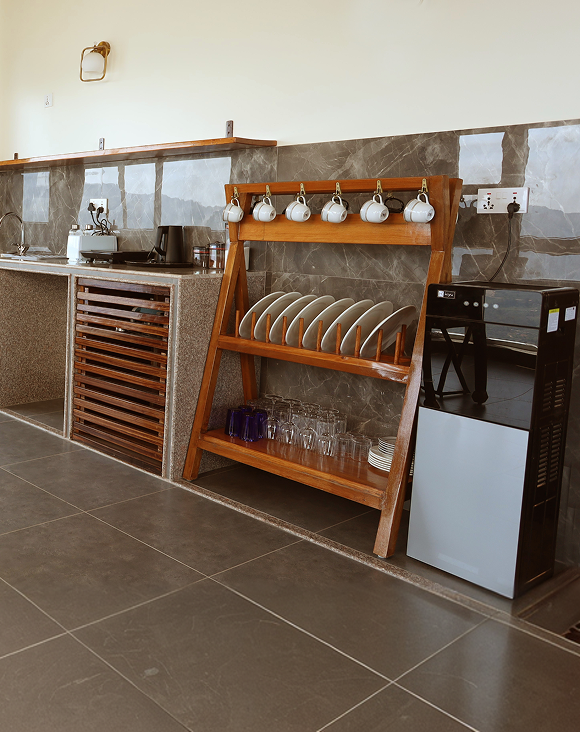 Still point Retreat dining area with wooden kitchen shelving and mountain views