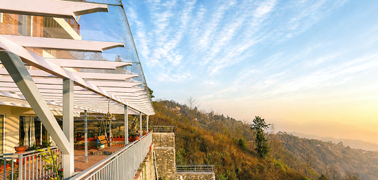 Balcony with mountain sunset view